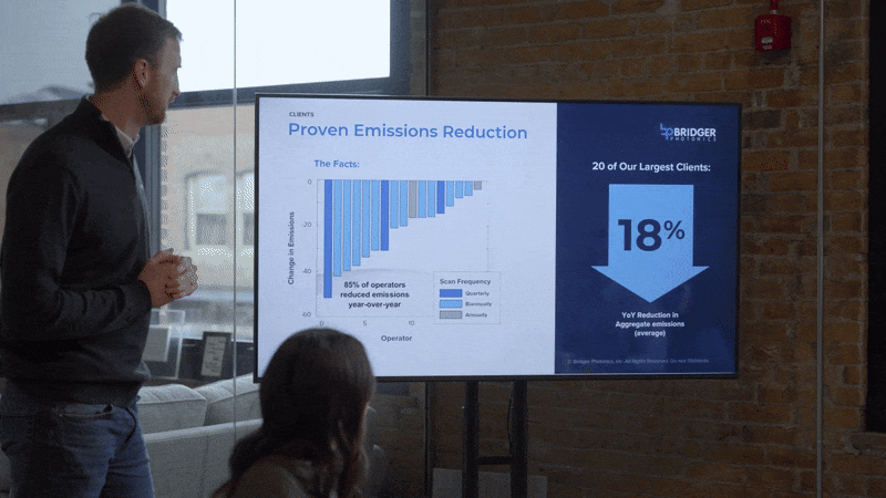 Man giving presentation on Proven Emissions Reduction